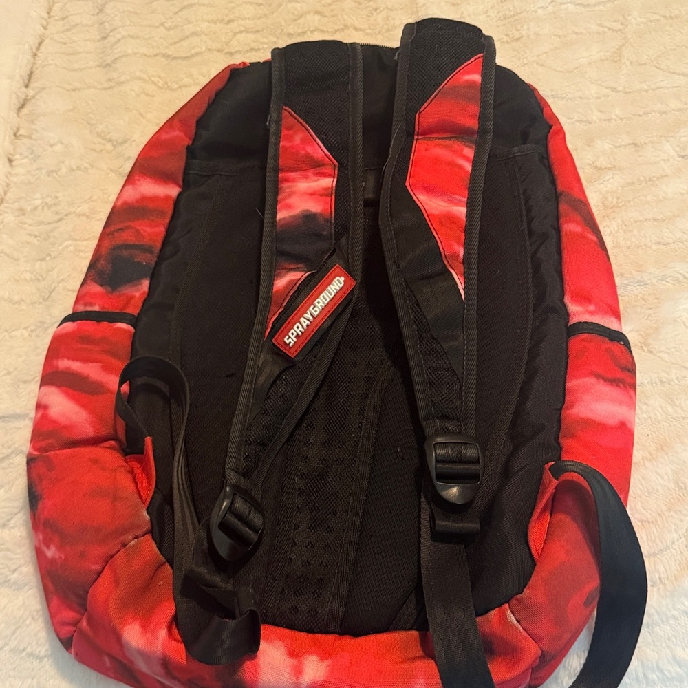 Sprayground Red and Black Tie-Dye Backpack with White Symbol - Picture 7 of 12